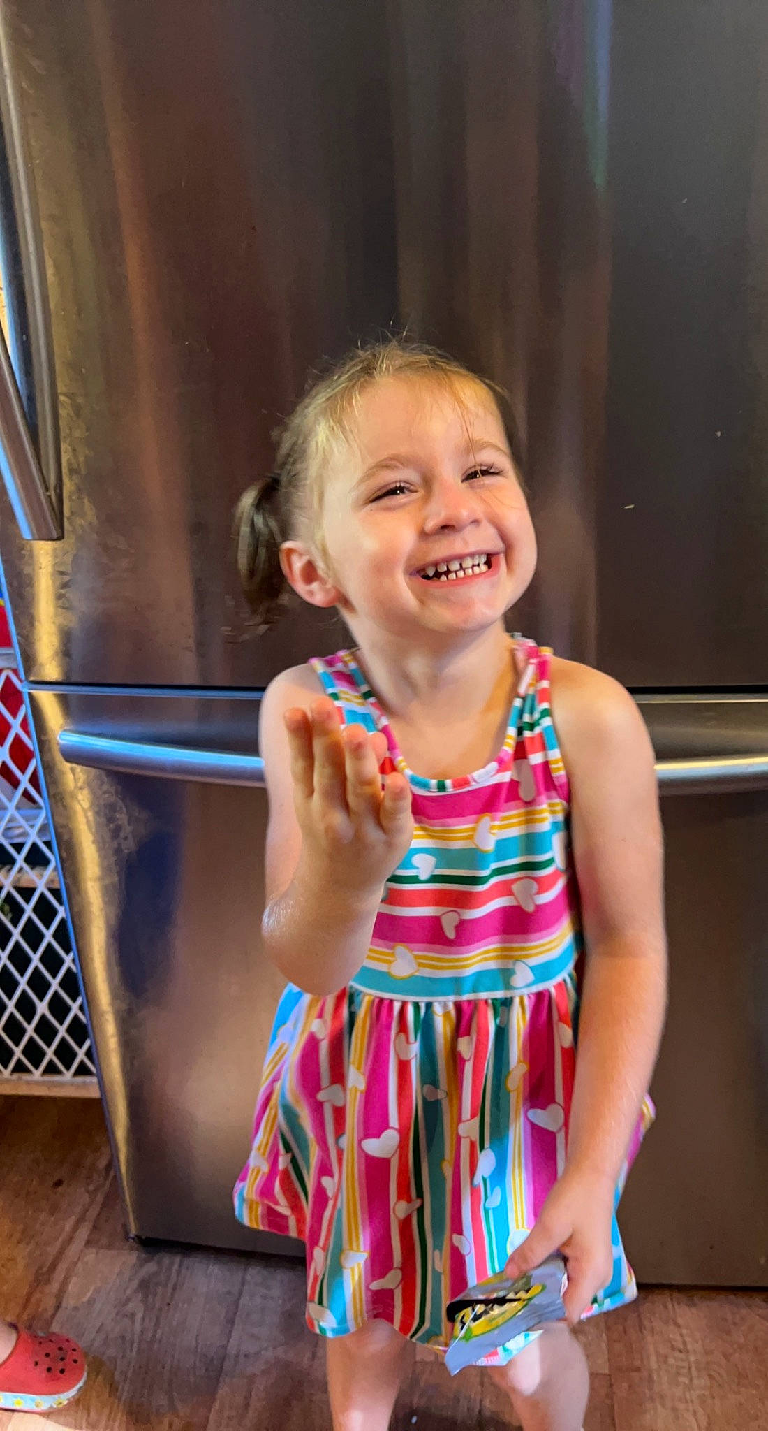 Kinsley is registered to the contest to win money with this photo: baby_toddler_clothing, blond, child, day_dress, electric_blue, event, face, facial_expression, fun, happy, iris, joy, leisure, pattern, person, pink, shoulder, skin, smile, standing