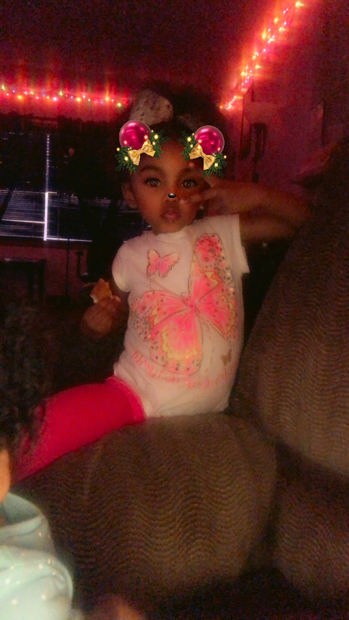 Laila is registered to the contest to win money with this photo: abdomen, child, dress, event, finger, fun, girl, human_body, lighting, organ, person, pink, skin, smile, textile, toddler, trunk