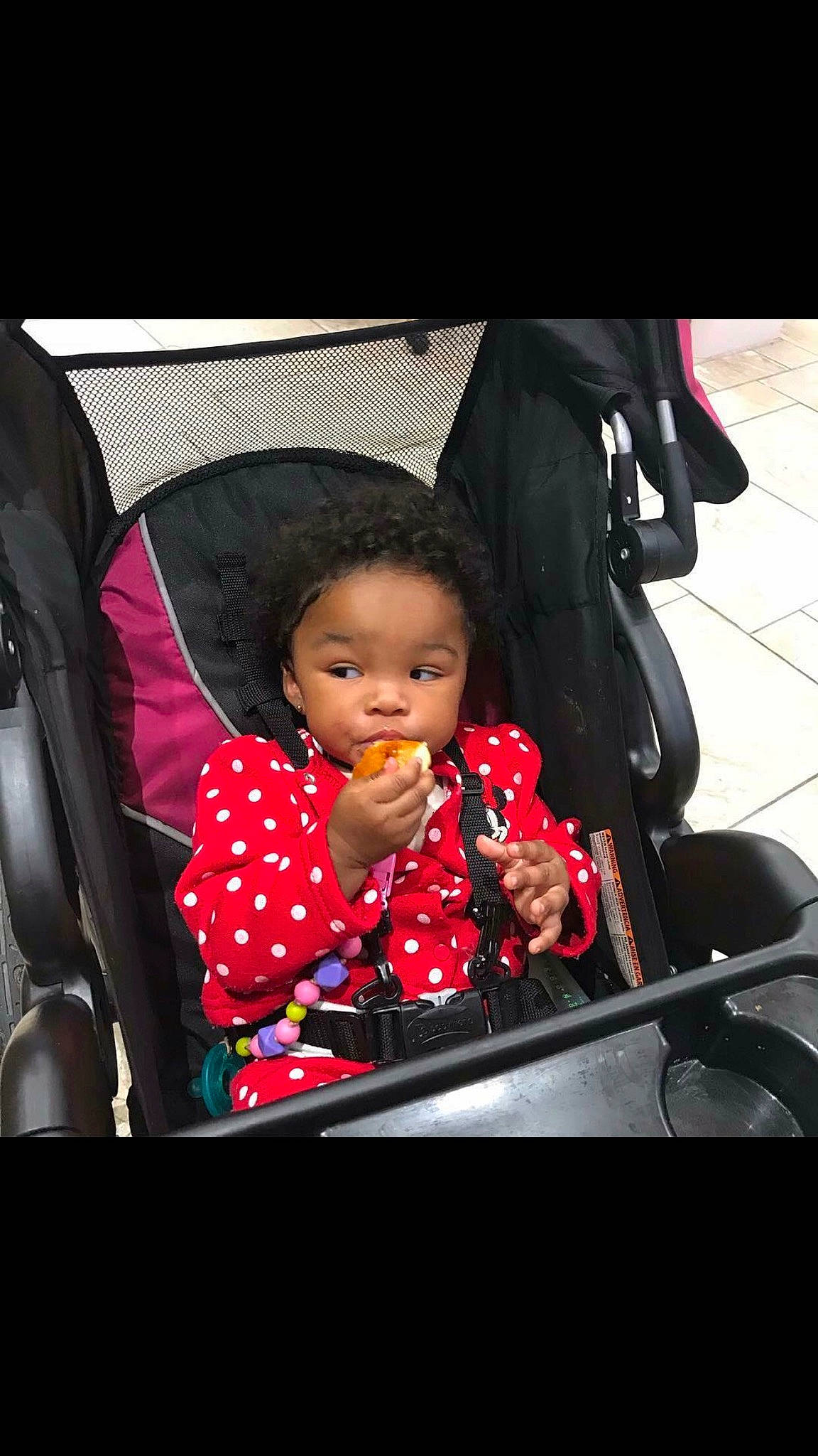 Rylei joined the competition — help win amazing prizes! baby_carriage, baby_products, black, black_hair, car, car_seat, child, eye, fun, girl, infant, person, product, red, sitting, smile, toddler