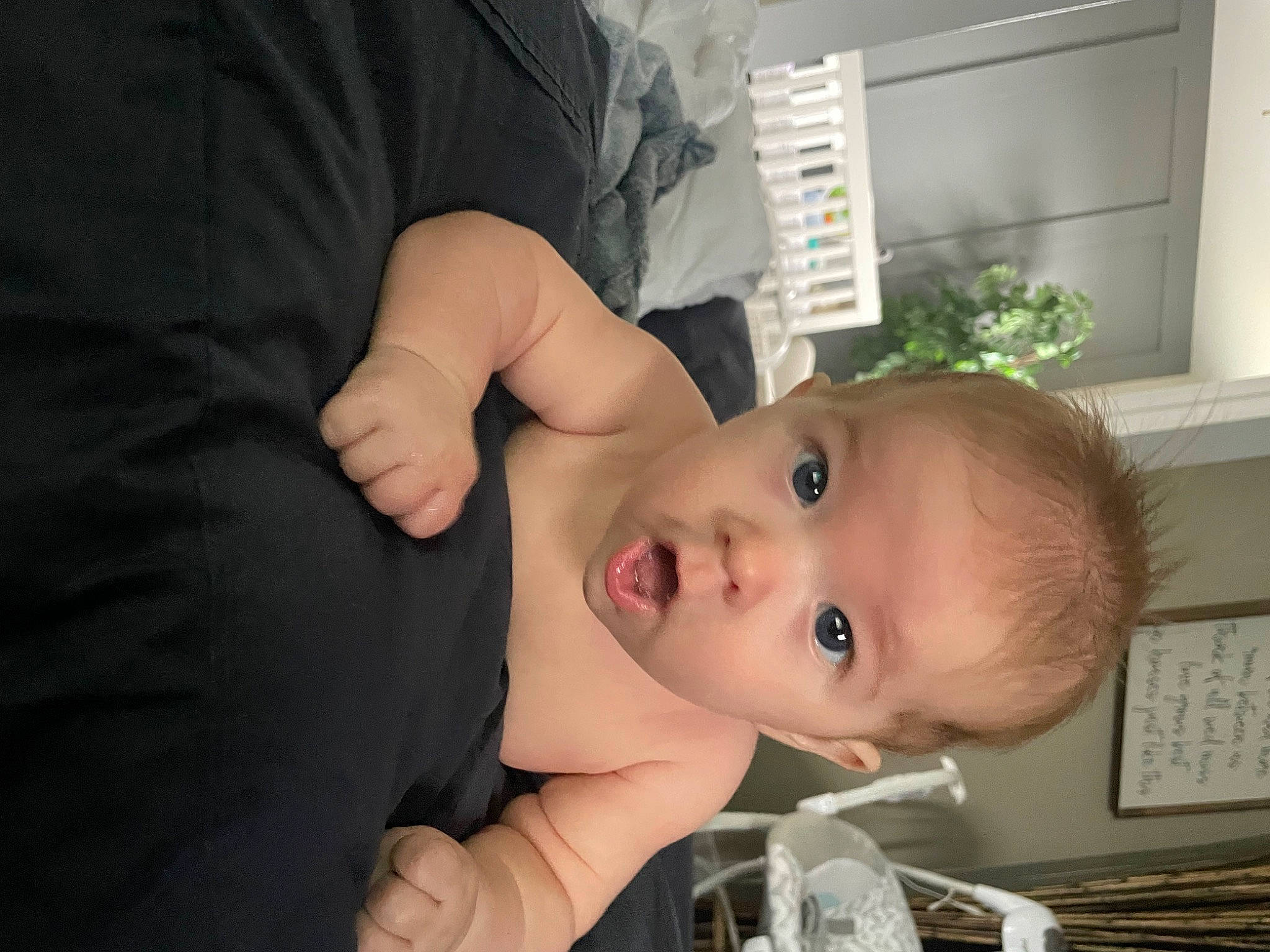 Wylder is registered to the contest to win money with this photo: arm, baby, baby_products, baby_toddler_clothing, cheek, child, ear, eye, eyelash, finger, gesture, grass, hand, happy, iris, nose, person, plant, smile, surprise