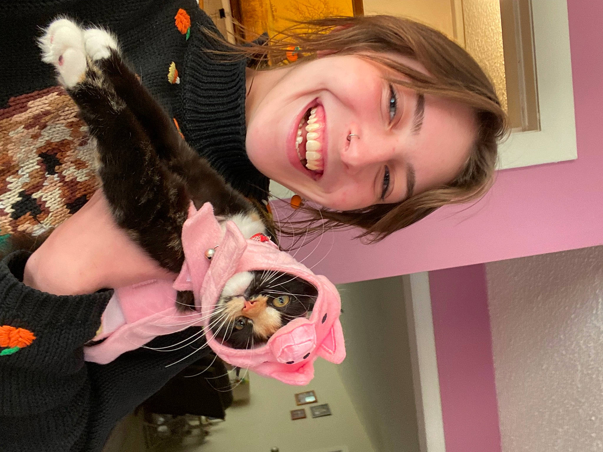 Poppy is registered to the contest to win money with this photo: arm, bangs, blond, child, dress, eye, eyelash, face, fashion_accessory, finger, fun, gesture, hair, happy, nail, pink, skin, smile, thigh, wrist