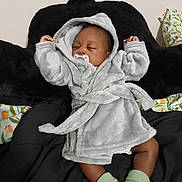 Kingston joined the competition — help win amazing prizes! baby, sleeping, robe, pacifier, socks, infant, child, blanket, black_background, floral_pattern, cozy, indoors, cute, soft, clothing, rest, peaceful, young, person, portrait