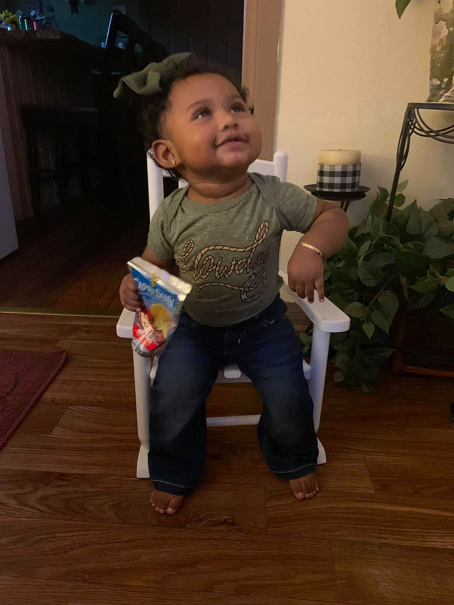 Nevaeh joined the competition — help win amazing prizes! baby, baby_toddler_clothing, cheek, child, floor, flooring, fun, happy, hardwood, houseplant, person, plant, sitting, sleeve, smile, t_shirt, toddler, varnish, wood, wood_flooring