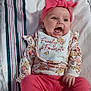 architecture, baby, babylaughing, bed, clothing, cushion, face, furniture, glove, happy, hat, head, homedecor, laughing, newborn, pants, person, photography, portrait, quilt