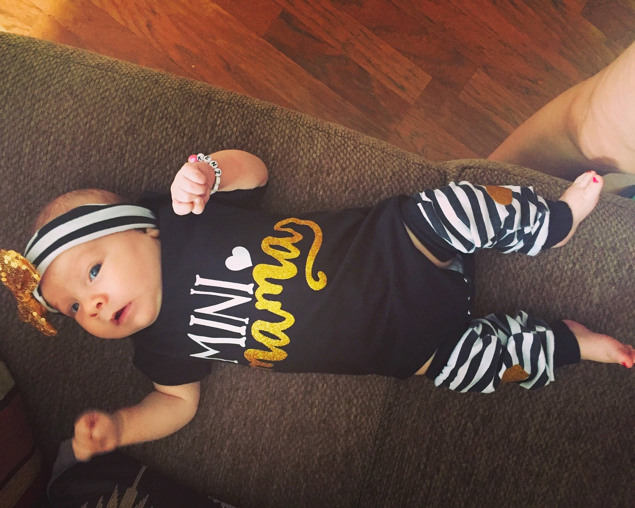 Kenzleigh is registered to the contest to win money with this photo: child, cool, footwear, headgear, headwear, joint, leg, person, t_shirt