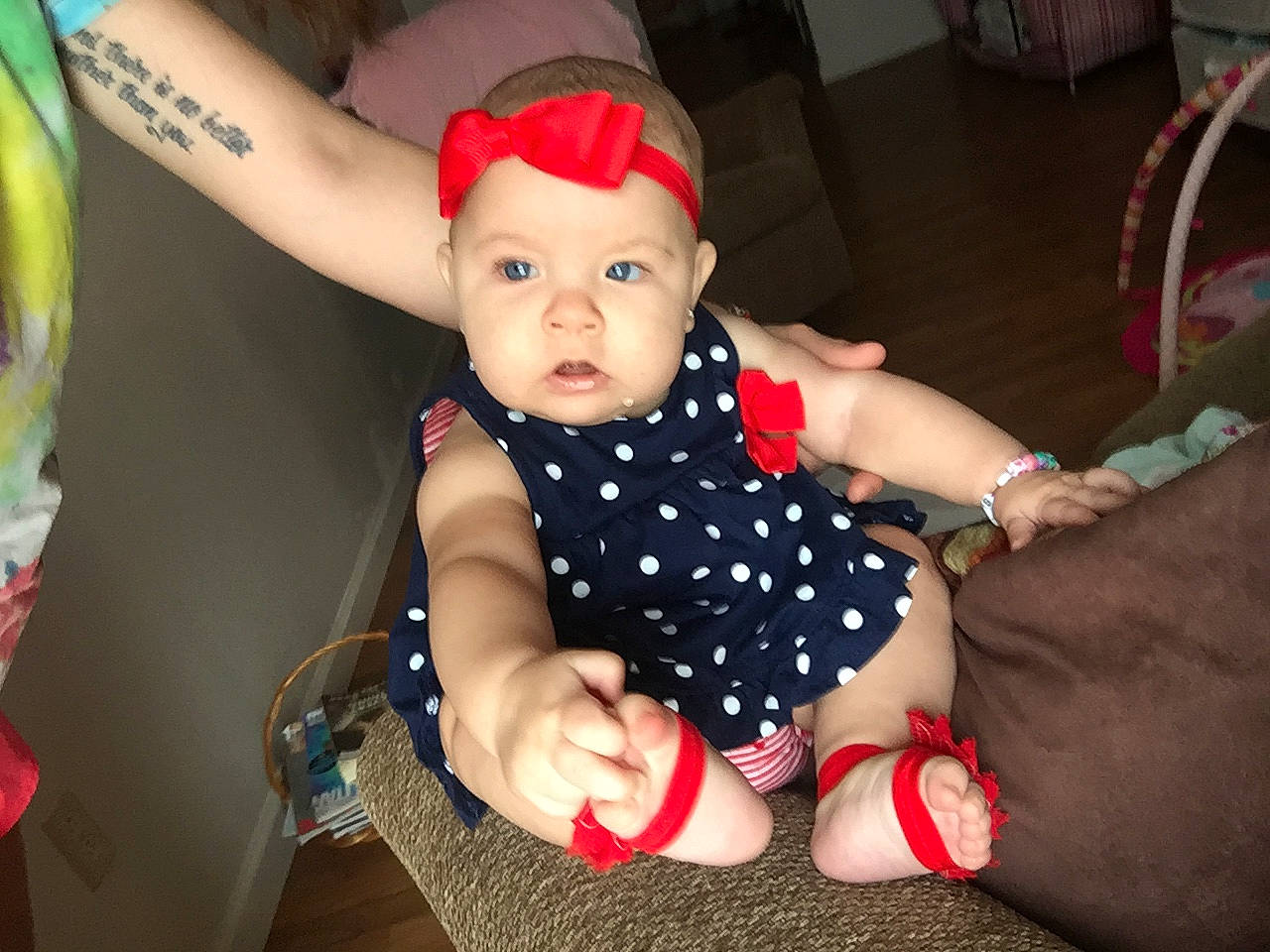Kenzleigh joined the competition — help win amazing prizes! baby, baby_products, baby_toddler_clothing, cheek, child, design, eye, hair_accessory, head, headband, headgear, lip, pattern, person, play, polka_dot, product, sitting, skin, smile