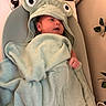 Elijah joined the competition — help win amazing prizes! baby, infant, towel, frog_hood, cute, lying_down, changing_pad, green_towel, soft_texture, face, small_hand, indoors, blanket, newborn, baby_care, baby_bath, child, cute_outfit, resting, adorable