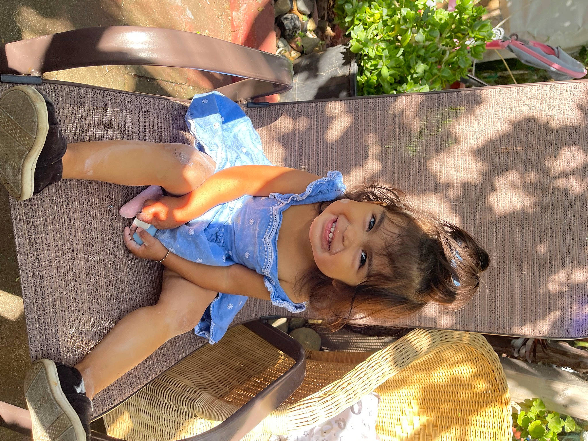 Zia is registered to the contest to win money with this photo: child, electric_blue, event, fun, grass, happy, hat, human_leg, joy, leisure, pattern, person, plant, recreation, shorts, smile, sock, summer, thigh, toddler