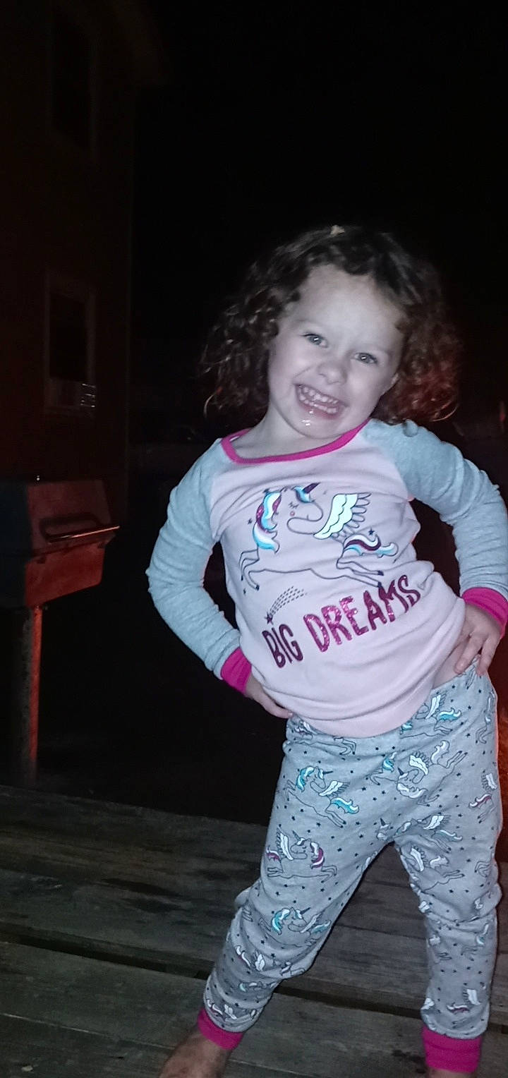 Vada is registered to the contest to win money with this photo: child, cool, fun, happy, joy, person, pink, sleeve, smile, standing, t_shirt, toddler