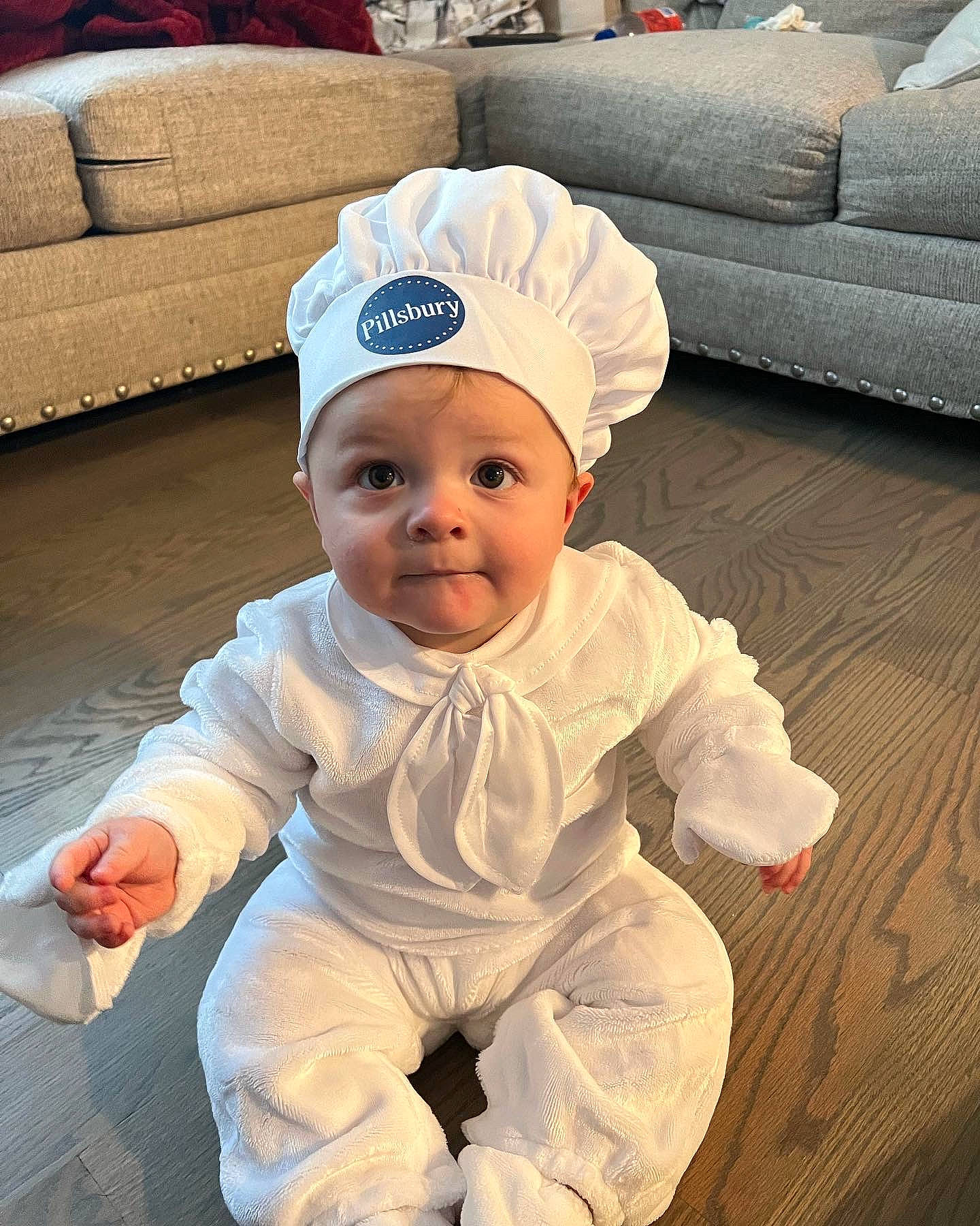 Gianni joined the competition — help win amazing prizes! art, baby, baby_toddler_clothing, cap, child, comfort, costume_hat, couch, face, fashion_accessory, floor, flooring, happy, headgear, headwear, linens, person, sleeve, smile, textile