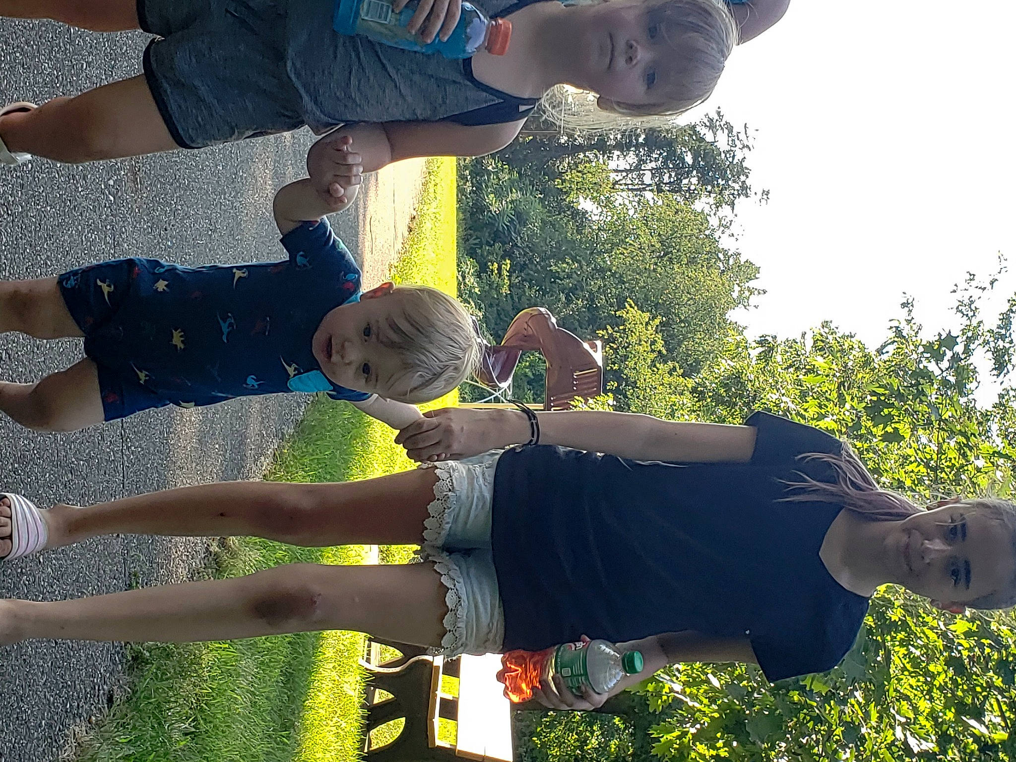 Rayven is registered to the contest to win money with this photo: arm, black, clothing, fun, gesture, grass, green, hand, happy, human_body, joint, leaf, leg, leisure, light, people_in_nature, person, photograph, plant, shorts