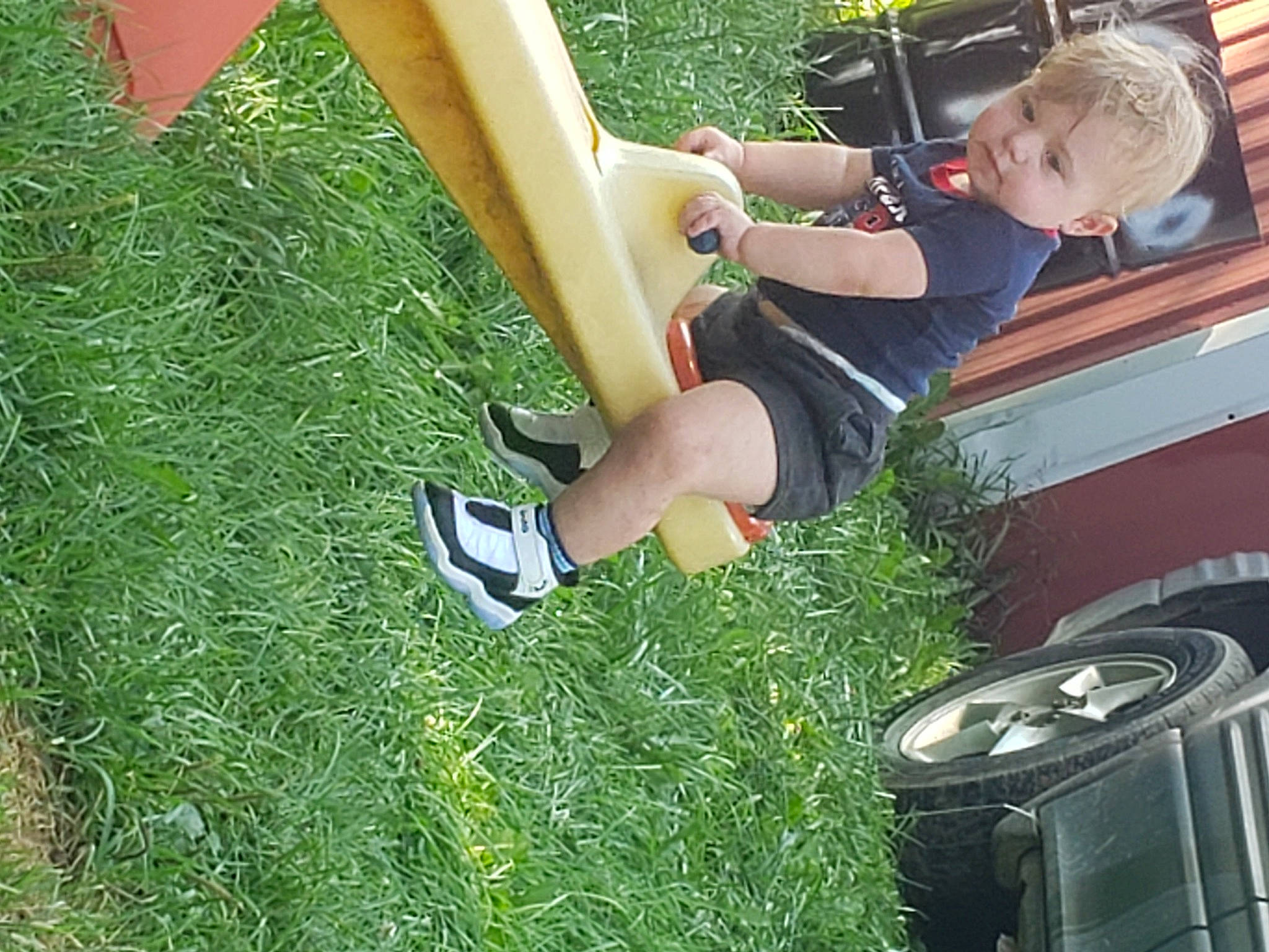 Rayven is registered to the contest to win money with this photo: boot, competition_event, fun, games, grass, human_leg, knee, lawn, leg, leisure, people_in_nature, person, plant, player, recreation, shorts, sneakers, sports, sports_gear, sportswear