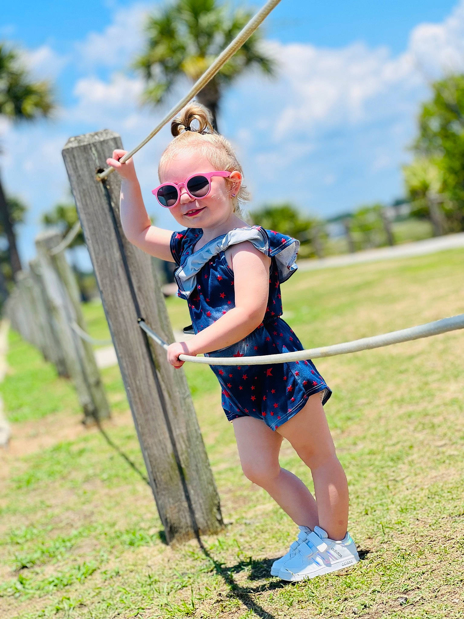 Harper joined the competition — help win amazing prizes! blond, cloud, electric_blue, eyewear, fun, glasses, grass, grassland, happy, leisure, person, plant, pole, recreation, sandal, sky, smile, street_fashion, sunglasses, toddler