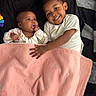 baby, bed, black, blanket, child, clothing, comfort, cute, earrings, face, family, happy, indoor, infant, pink, portrait, relax, siblings, smile, toddler