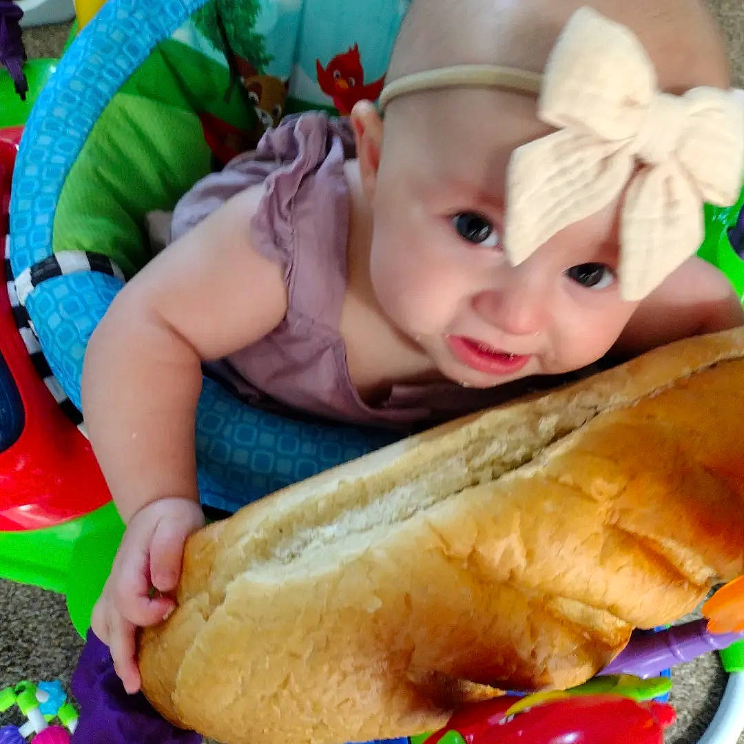 Lillie joined the competition — help win amazing prizes! baby, baby_products, baby_toddler_clothing, cap, child, comfort_food, fedora, finger_food, food, fun, happy, hat, headwear, ingredient, junk_food, linens, person, play, sitting, skin