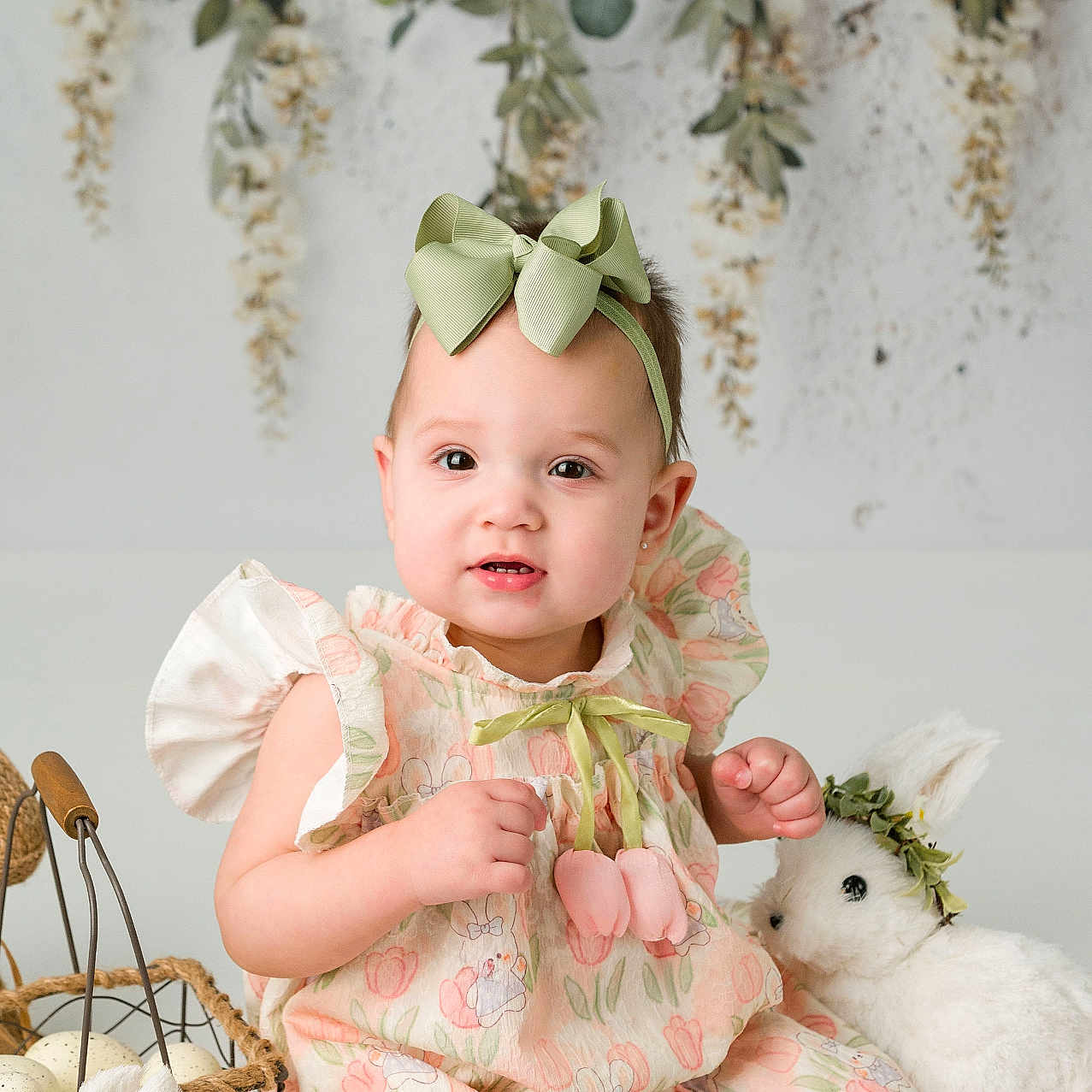 Juliana is registered to the contest to win money with this photo: accessories, baby, bodypart, clothing, dress, face, flower, flowerarrangement, flowerbouquet, formalwear, happy, hat, head, person, photography, plant, portrait, sitting, smile, toy