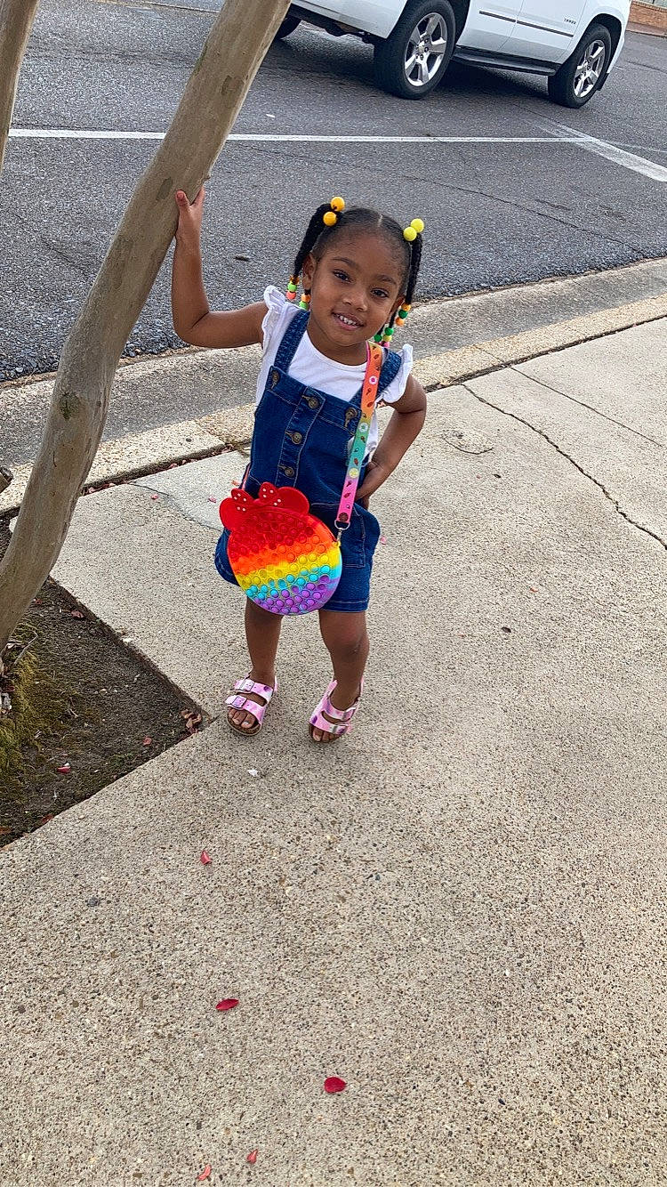 Jleigh joined the competition — help win amazing prizes! asphalt, child, electric_blue, event, fun, happy, hat, joy, leisure, pedestrian, person, recreation, road, road_surface, sandal, shorts, sidewalk, smile, street, t_shirt