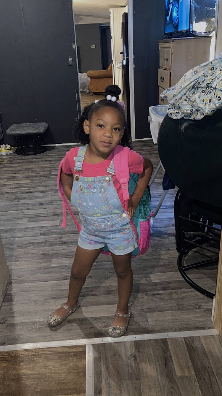 Valleigh is registered to the contest to win money with this photo: beauty, child, flip_flops, flooring, foot, fun, hairstyle, human_leg, leisure, magenta, people, person, pink, sandal, sitting, snapshot, standing, thigh, toddler, vacation