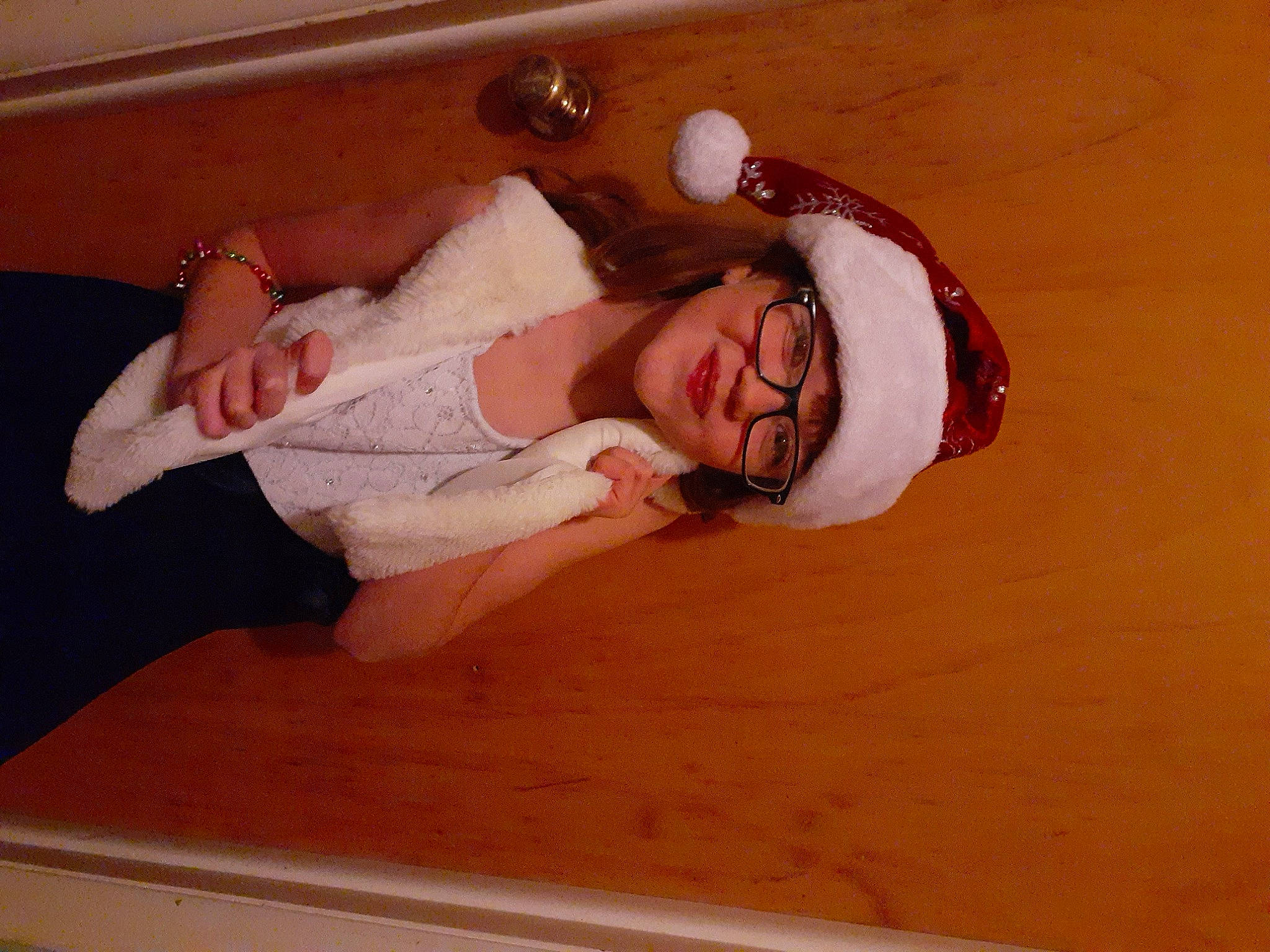 Annabella is registered to the contest to win money with this photo: abdomen, chest, child, comfort, elbow, eyewear, flesh, fun, happy, hardwood, headwear, human_leg, jewellery, joy, knee, linens, person, room, smile, thigh