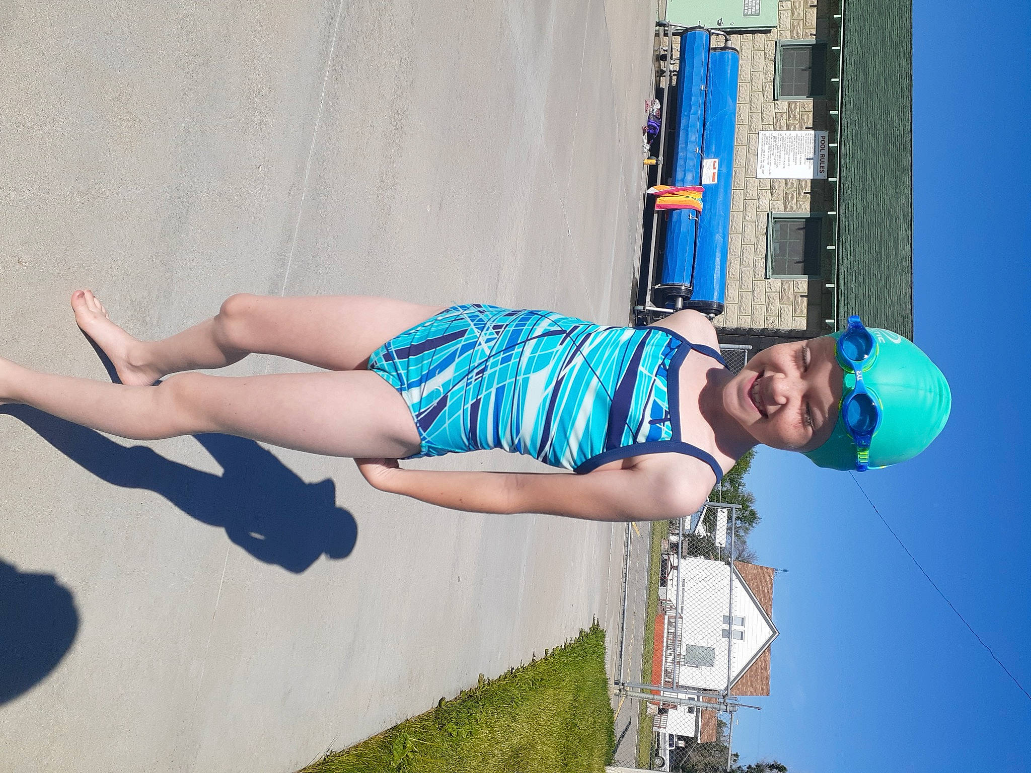Annabella is registered to the contest to win money with this photo: blue, elbow, electric_blue, happy, headwear, human_body, human_leg, joy, knee, leg, leisure, line, person, photograph, plant, recreation, shorts, shoulder, sky, smile