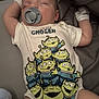 baby, sleeping, pacifier, onesie, cartoon_characters, aliens, clothing, infant, cute, soft_lighting, blanket, indoor, hand_mittens, peaceful, child, portrait, closeup, rest, cute_outfit, sleep