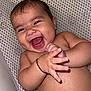 baby, laughing, smiling, bathtub, water, wet_skin, bath_mat, infant, happy, cute, child, skin, hand, closeup, playful, portrait, indoors, person, expression, young