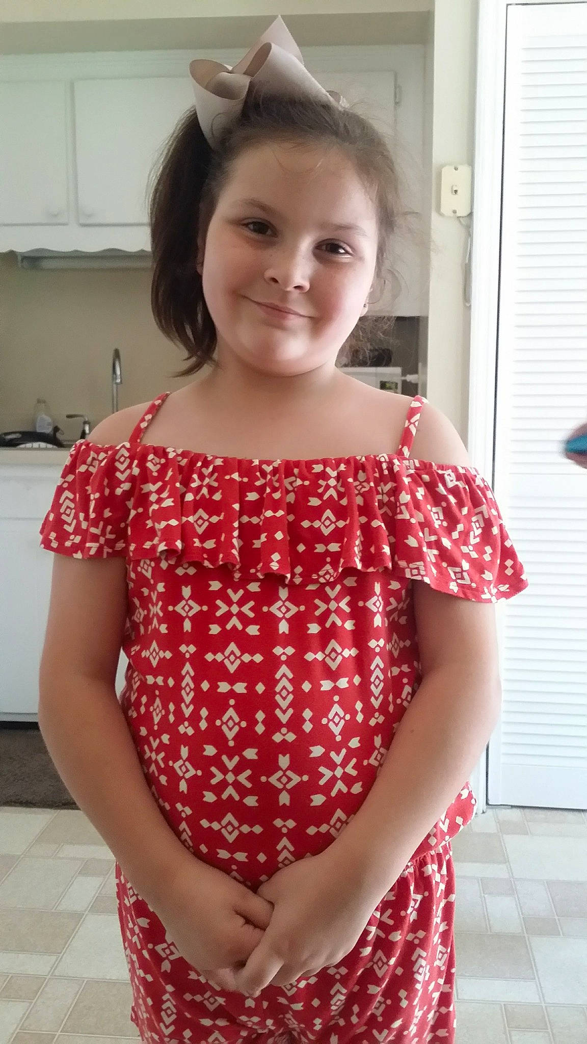 Brynley is registered to the contest to win money with this photo: child, child_model, clothing, design, dress, joint, joy, pattern, person, polka_dot, shoulder, skin, sleeve, textile, toddler