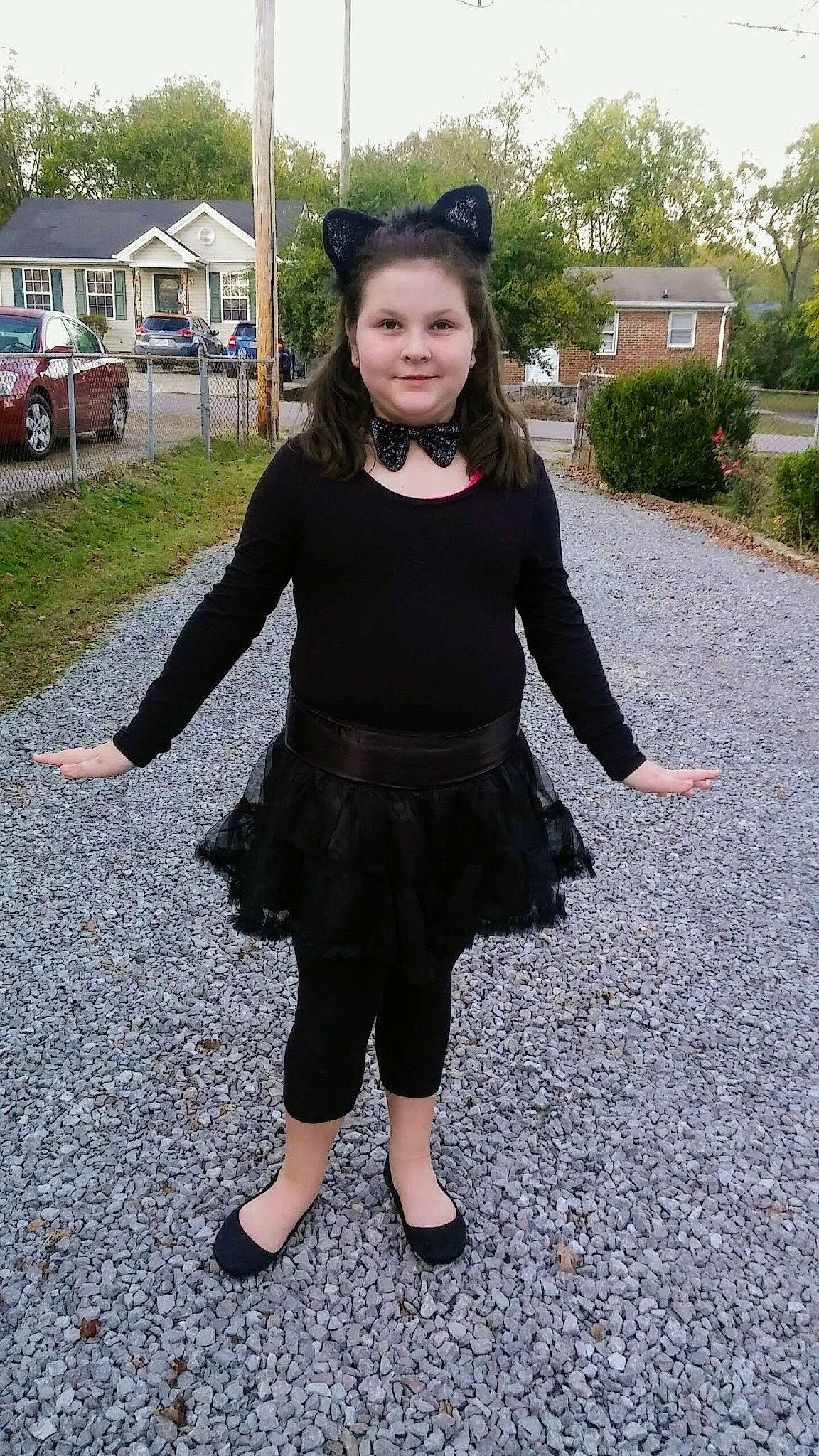 Brynley is registered to the contest to win money with this photo: child, clothing, costume, dress, footwear, joy, person, smile, textile