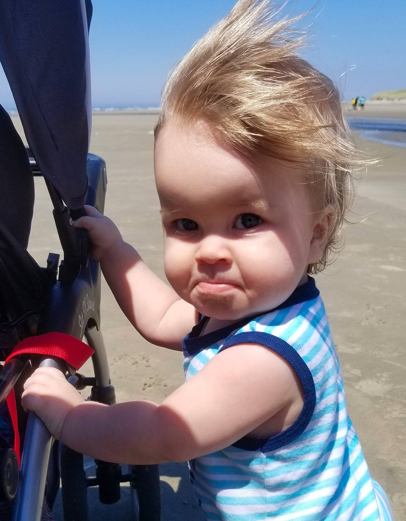 Fisher is registered to the contest to win money with this photo: azure, baby, baby_products, baby_toddler_clothing, beach, child, electric_blue, fun, gesture, happy, leisure, person, recreation, skin, sky, smile, summer, toddler, travel, vacation