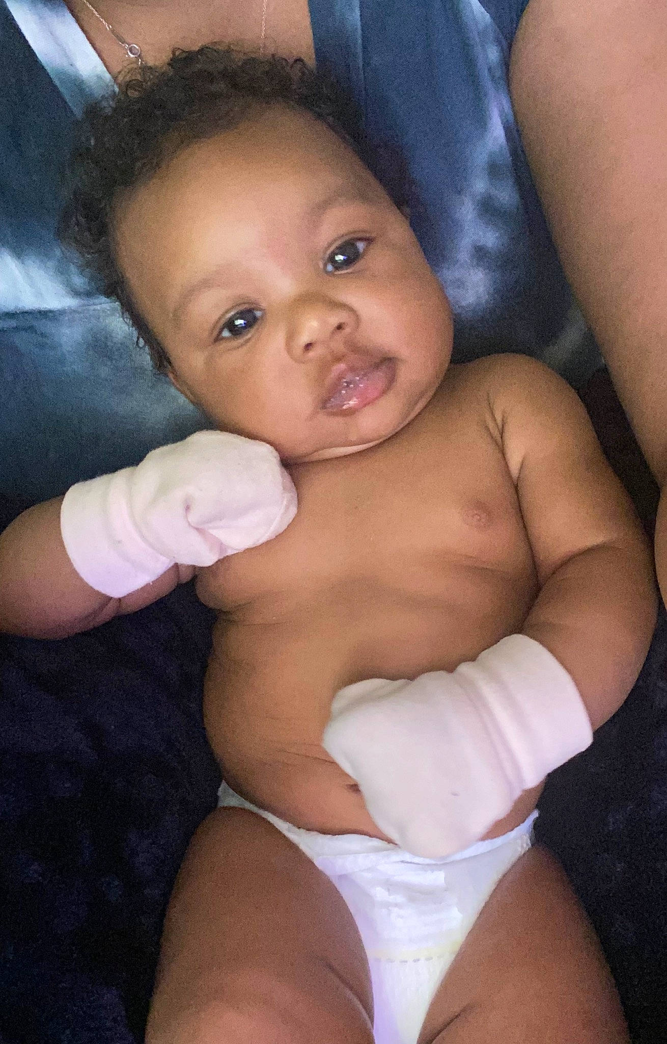 Amani is registered to the contest to win money with this photo: arm, cheek, comfort, eye, eyebrow, face, facial_expression, hair, hairstyle, hand, head, joint, lip, mouth, muscle, nose, organ, person, shoulder, skin