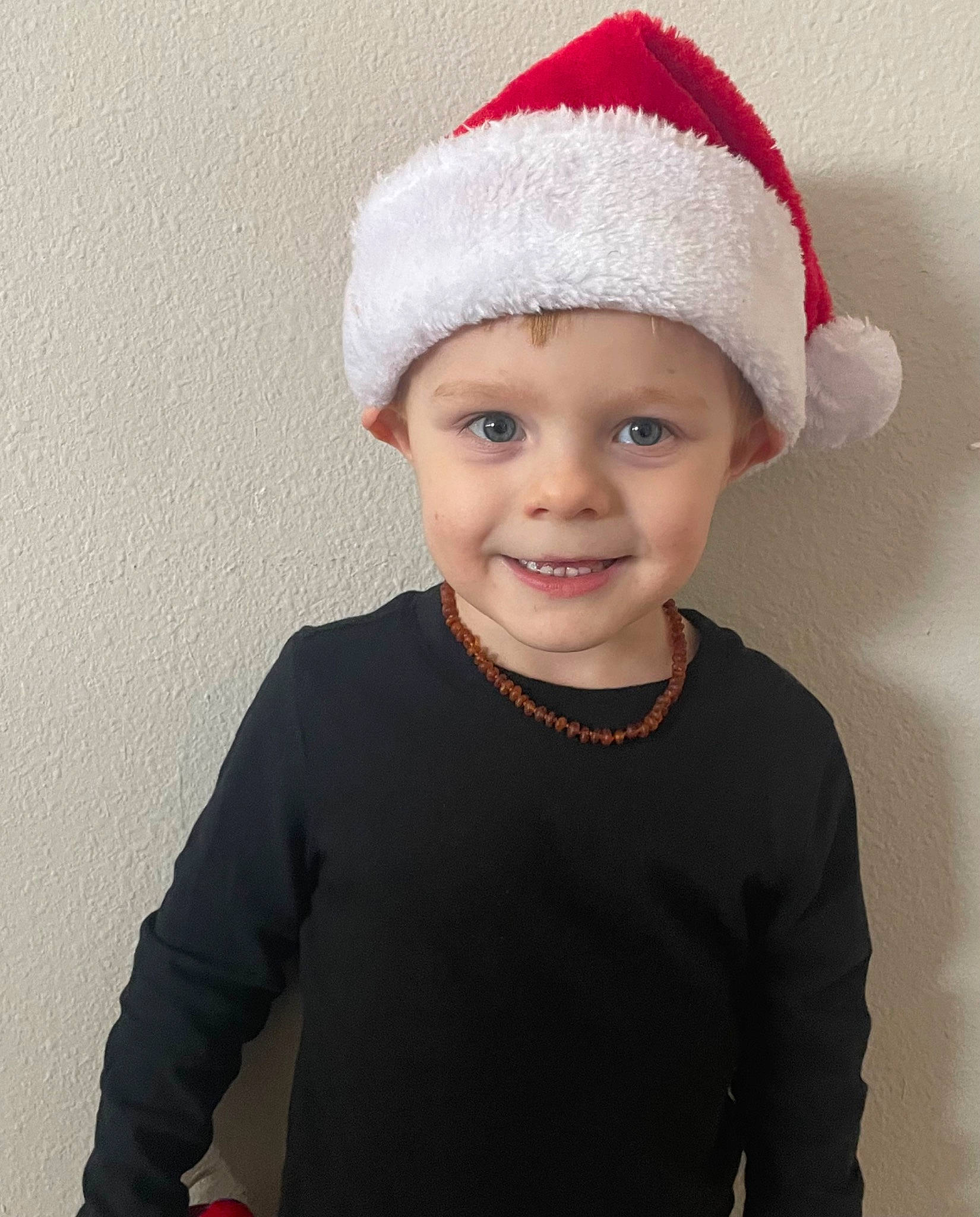 Cash is registered to the contest to win money with this photo: baby_toddler_clothing, cap, child, clothing, costume_hat, event, face, fashion_accessory, happy, hat, headgear, headwear, holiday, jewellery, joy, outerwear, person, sleeve, smile, standing