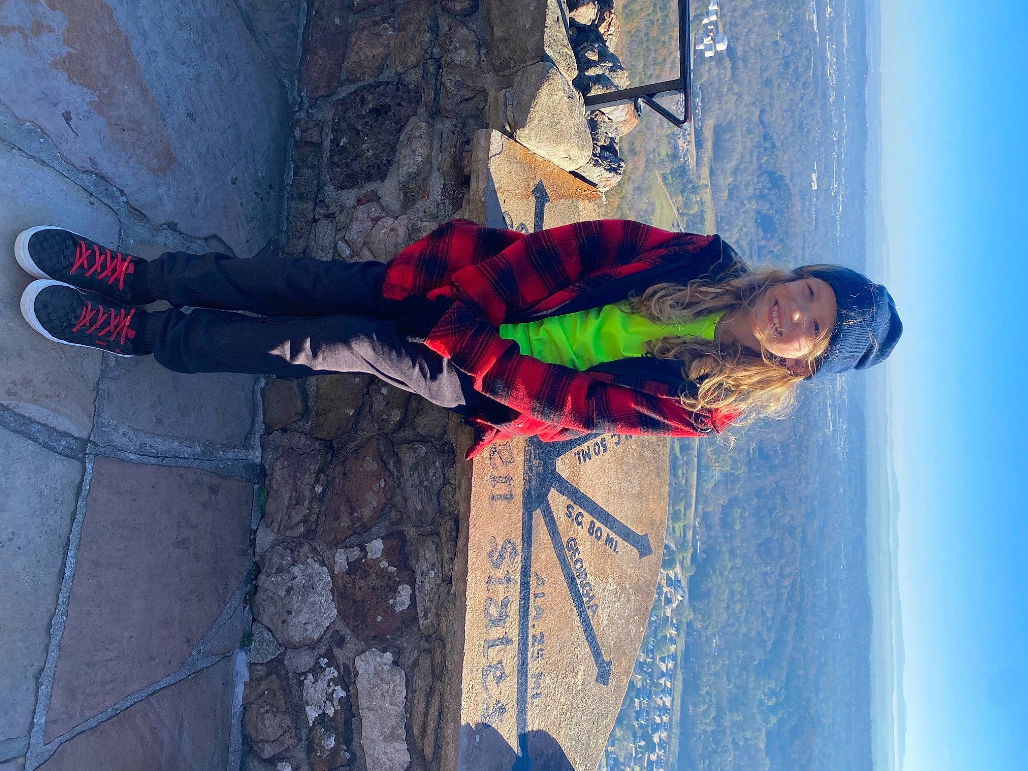 Riley is registered to the contest to win money with this photo: adventure, asphalt, carmine, concrete, cool, electric_blue, flooring, fun, headwear, human_leg, joy, pattern, person, recreation, road_surface, shadow, sidewalk, sky, tints_and_shades, walking_shoe