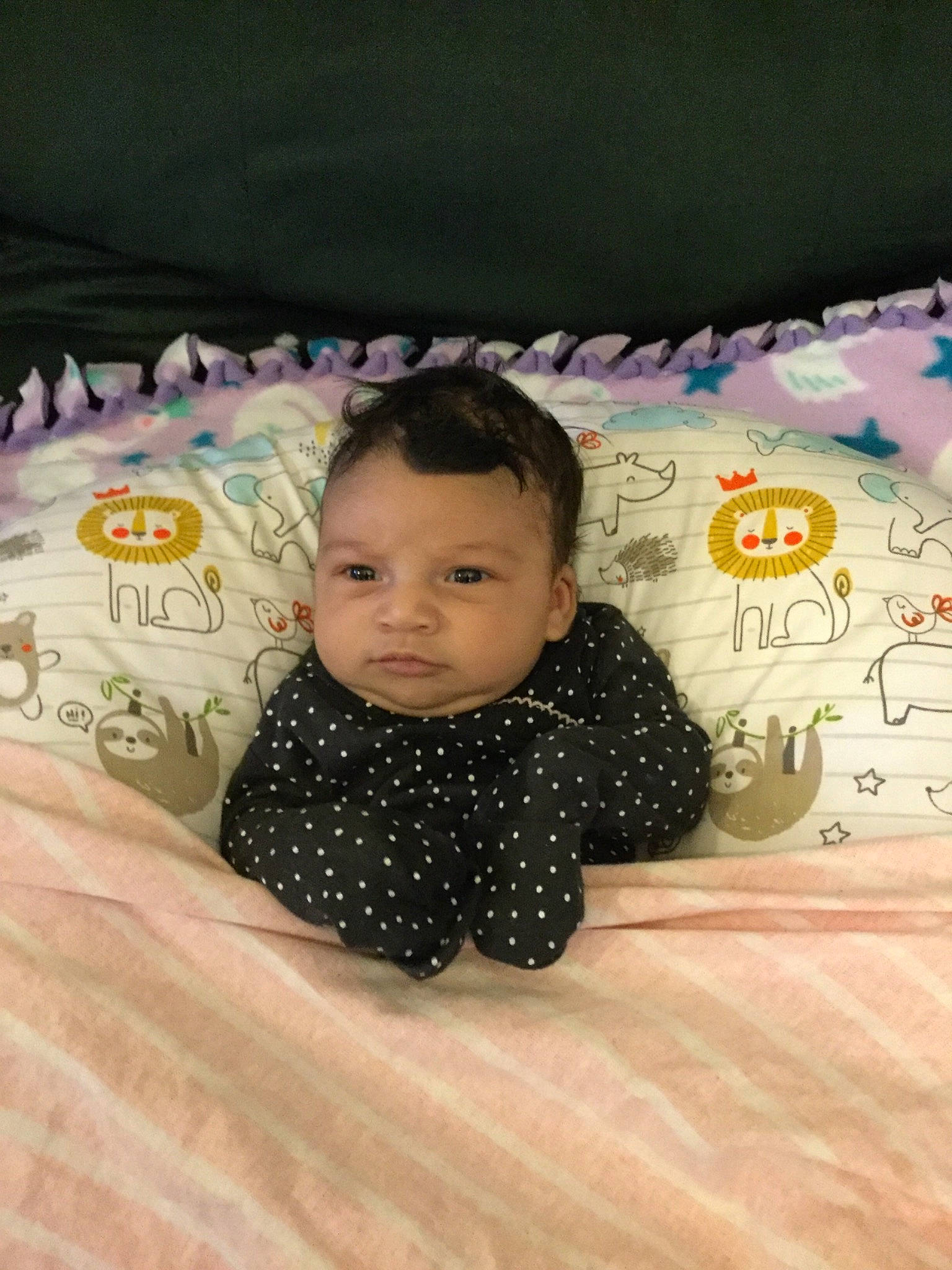 Audree is registered to the contest to win money with this photo: baby, bed, cheek, child, face, fun, furniture, happy, head, person, pink, room, skin, smile, textile, toddler