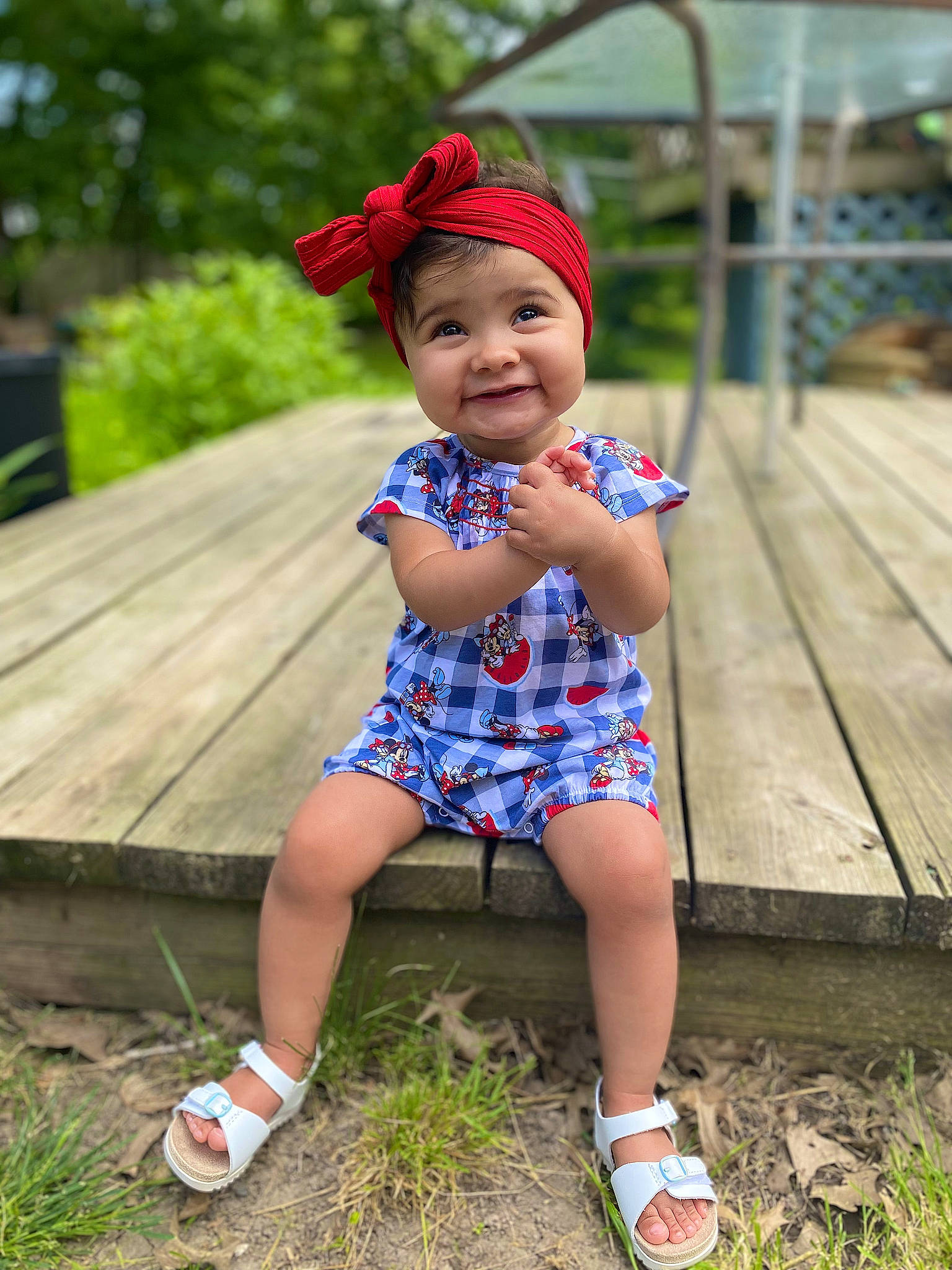 Zayla is registered to the contest to win money with this photo: baby, baby_toddler_clothing, electric_blue, face, footwear, grass, happy, hat, headgear, headwear, joy, leaf, leisure, people_in_nature, person, plant, recreation, shoe, shorts, smile