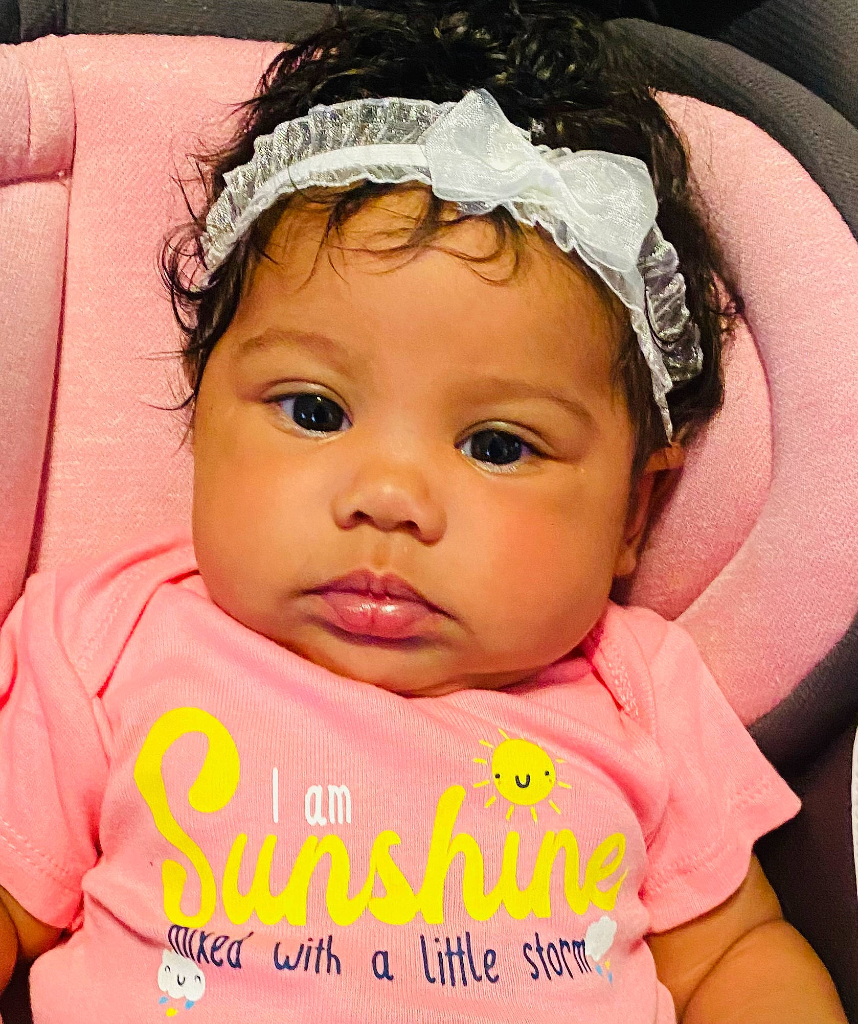 Treasure is registered to the contest to win money with this photo: baby, baby_toddler_clothing, cap, cheek, child, chin, cool, eyebrow, eyelash, face, happy, headwear, lip, mouth, nose, person, pink, product, skin, textile