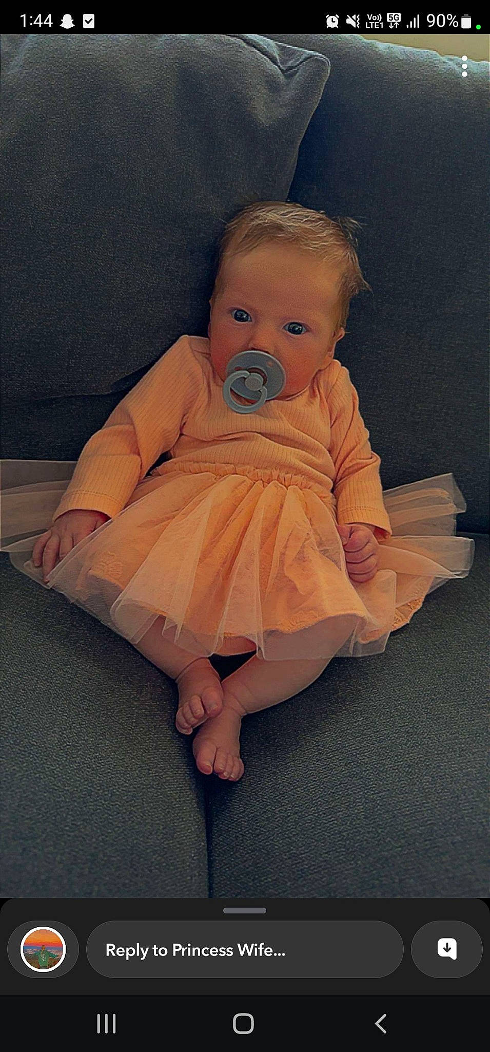 Anastasia is registered to the contest to win money with this photo: arm, baby, baby_toddler_clothing, blond, cheek, comfort, day_dress, dress, eye, face, finger, flash_photography, flooring, head, human_leg, iris, person, sitting, skin, sleeve