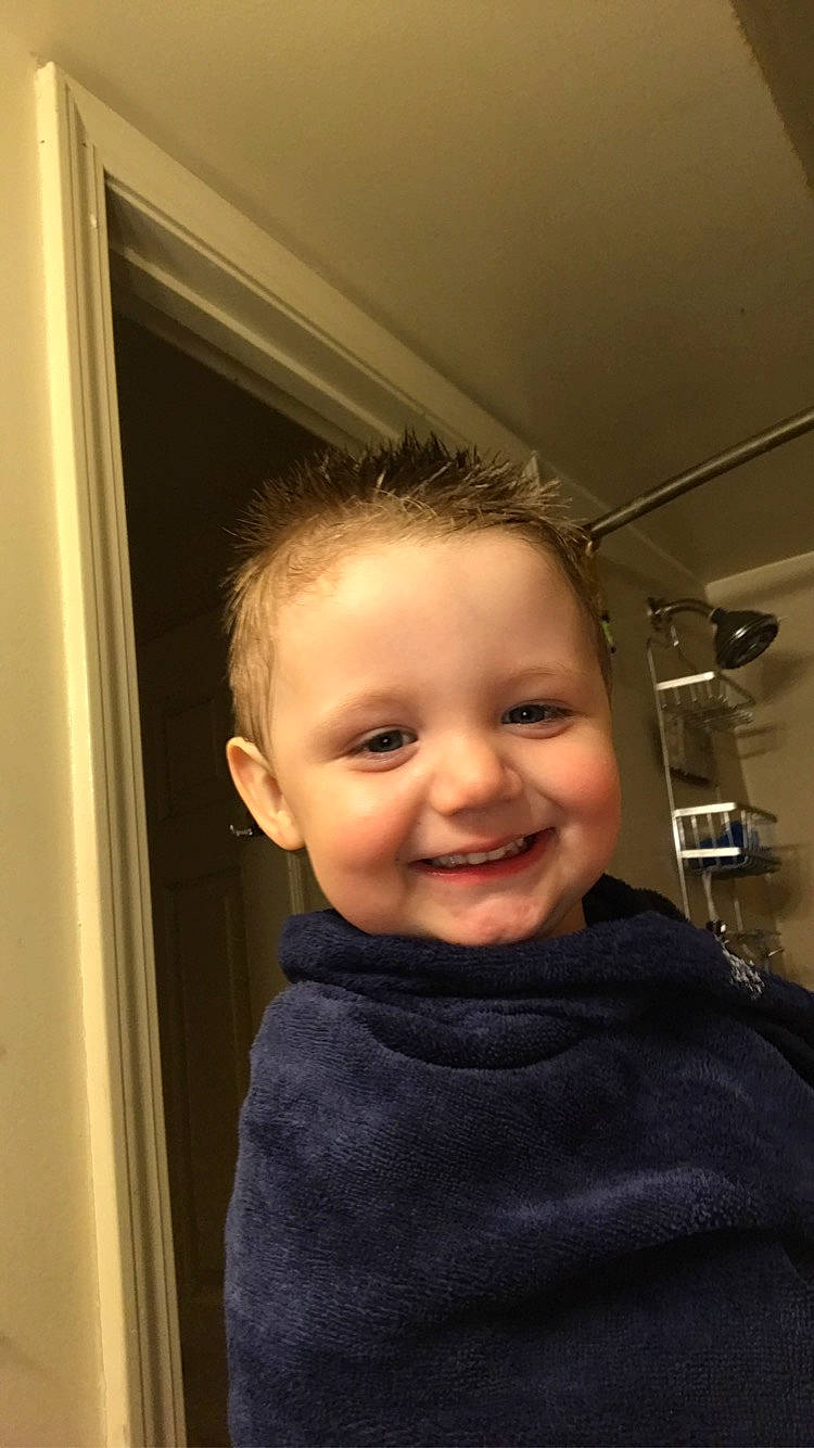 Kolten is registered to the contest to win money with this photo: baby, baby_toddler_clothing, cheek, child, eyebrow, eyelash, facial_hair, flash_photography, fun, happy, iris, joy, laugh, lip, nose, person, room, sitting, smile, toddler