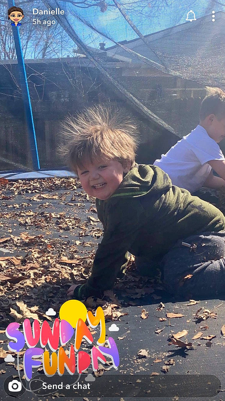 Kolten is registered to the contest to win money with this photo: asphalt, child, city, cool, fun, grass, happy, joy, leisure, people, people_in_nature, person, play, recreation, road_surface, shadow, sitting, soil, t_shirt, tints_and_shades