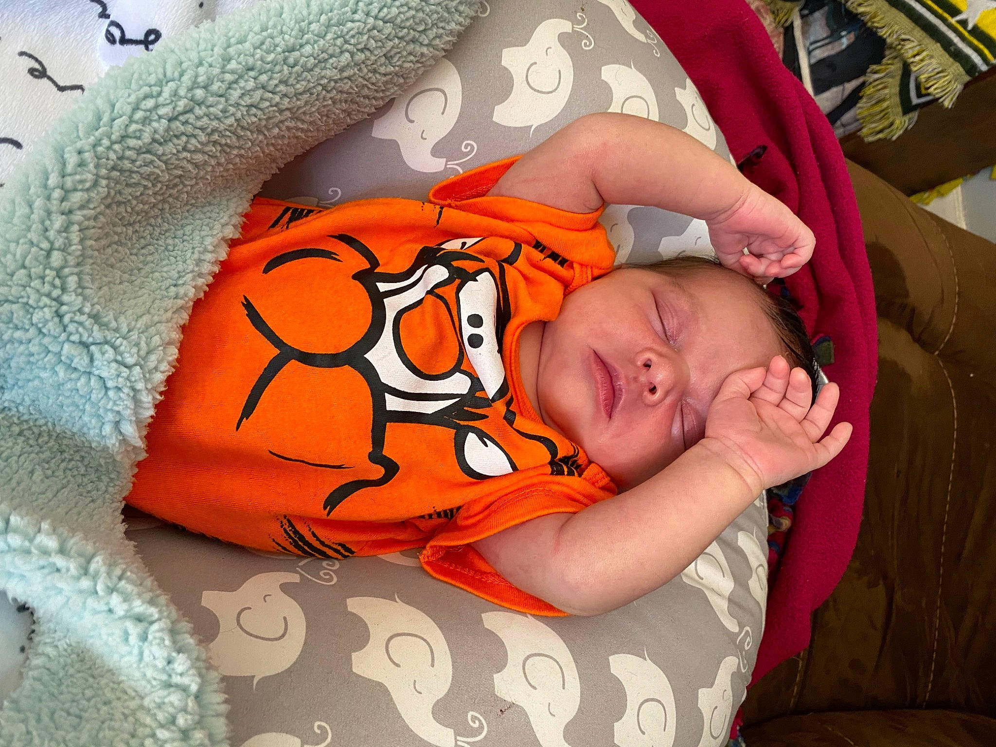 Bella joined the competition — help win amazing prizes! baby, baby_products, baby_sleeping, baby_toddler_clothing, bed, bedding, bedtime, child, comfort, finger, fun, happy, linens, mouth, nap, orange, pattern, person, room, textile