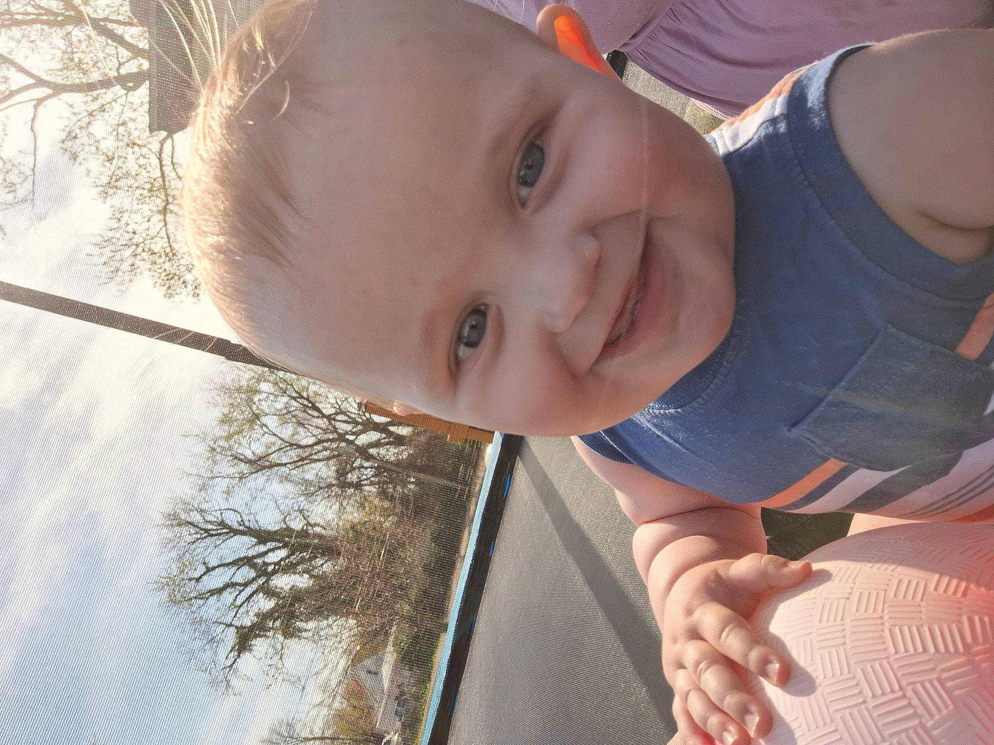 Phoenix is registered to the contest to win money with this photo: baby, beauty, child, eye, finger, fun, gesture, grass, hand, happy, human_body, joy, leisure, mouth, nose, person, skin, smile, thumb, toddler