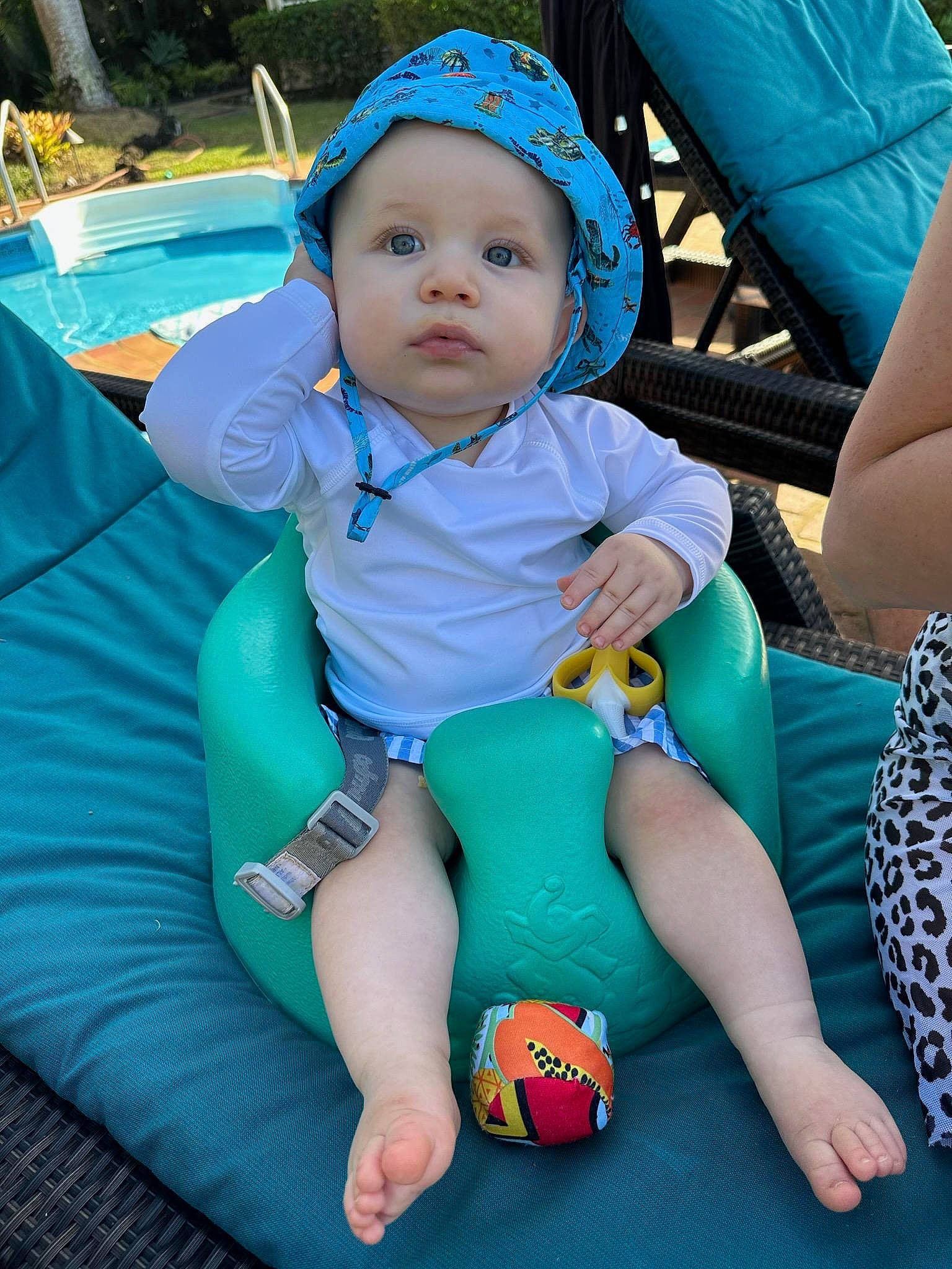 Tito joined the competition — help win amazing prizes! aqua, azure, baby, baby_products, baby_toddler_clothing, blue, chair, child, comfort, electric_blue, event, fun, grass, green, happy, headwear, lap, leisure, person, recreation