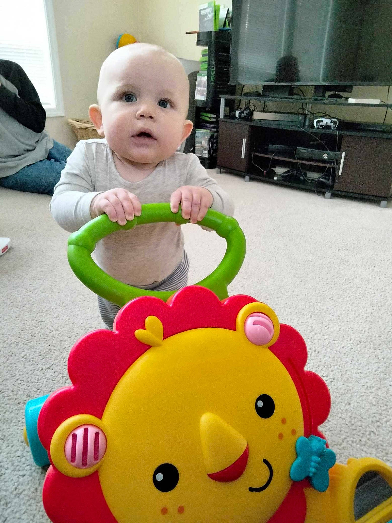 Tito joined the competition — help win amazing prizes! baby, baby_playing_with_toys, baby_toddler_clothing, cabinetry, cheek, child, drawer, facial_expression, fun, green, happy, head, home_appliance, kitchen_appliance, person, snapshot, television, toddler, toy, white