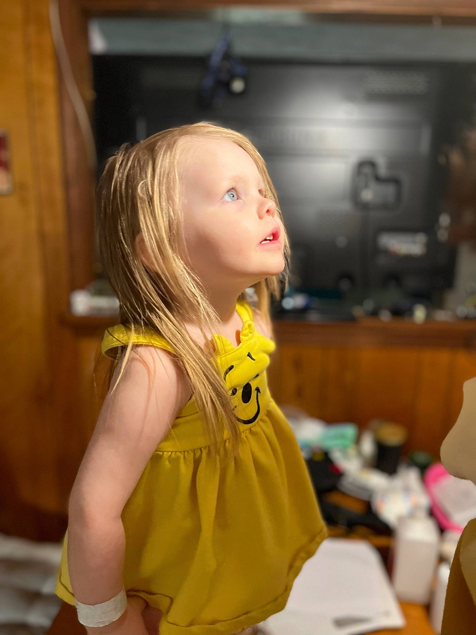 Ivory is registered to the contest to win money with this photo: bangs, blond, brown_hair, cheek, child, doll, door, eyelash, fashion_design, fun, hair_coloring, long_hair, person, room, sitting, toy, wig, wood