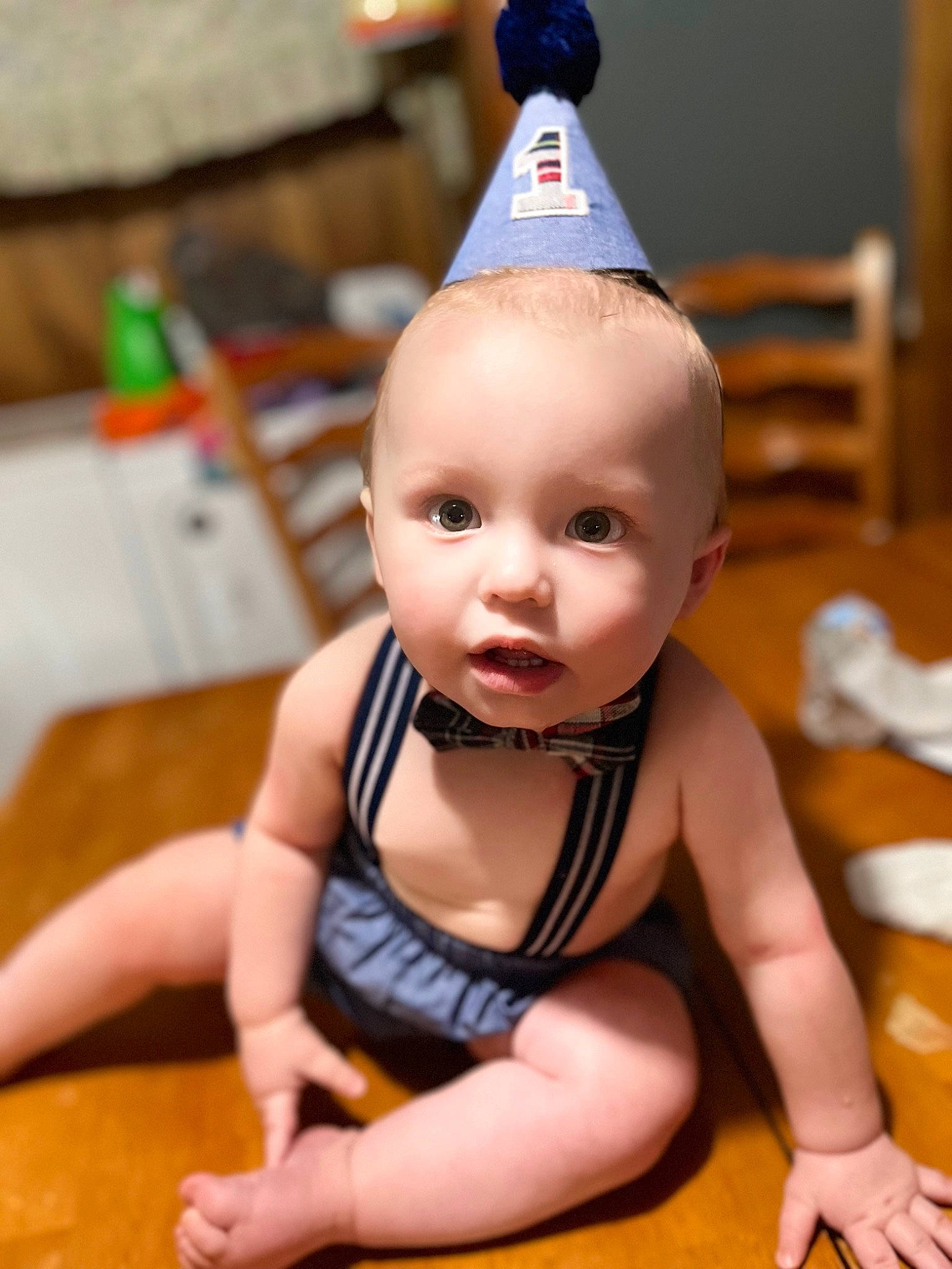 Walter joined the competition — help win amazing prizes! baby, baby_products, baby_toddler_clothing, cheek, child, cone, costume_hat, fashion_accessory, finger, flooring, fun, happy, hardwood, party_hat, party_supply, person, sitting, smile, thumb, toddler
