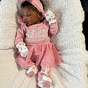 Mellody joined the competition — help win amazing prizes! baby, infant, newborn, sleeping, pink_outfit, bow_headband, mittens, socks, tutu, glitter_text, fluffy_blanket, cozy, portrait, closeup, indoors, peaceful, soft_texture, sleepwear, child, cute