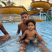 Millier is registered to the contest to win money with this photo: boys, child, colorful, curly_hair, family, fun, happy, leisure, outdoor, playful, pool, recreation, sitting, summer, sunset, swimming, vacation, water, water_park, water_slide