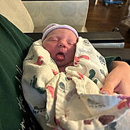 Kayson joined the competition — help win amazing prizes! newborn, baby, sleeping, blanket, hospital, infant, cap, person, hand, footprint_pattern, cradling, indoor, furniture, medical_equipment, bed, shirt, closeup, wrapped, peaceful, care