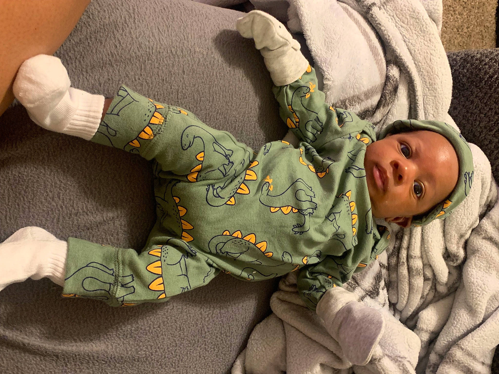 Zayvion is registered to the contest to win money with this photo: baby, baby_products, baby_sleeping, baby_toddler_clothing, bedtime, camouflage, child, comfort, gesture, human_leg, linens, military_camouflage, nail, nap, pattern, person, product, sleeve, textile, toddler