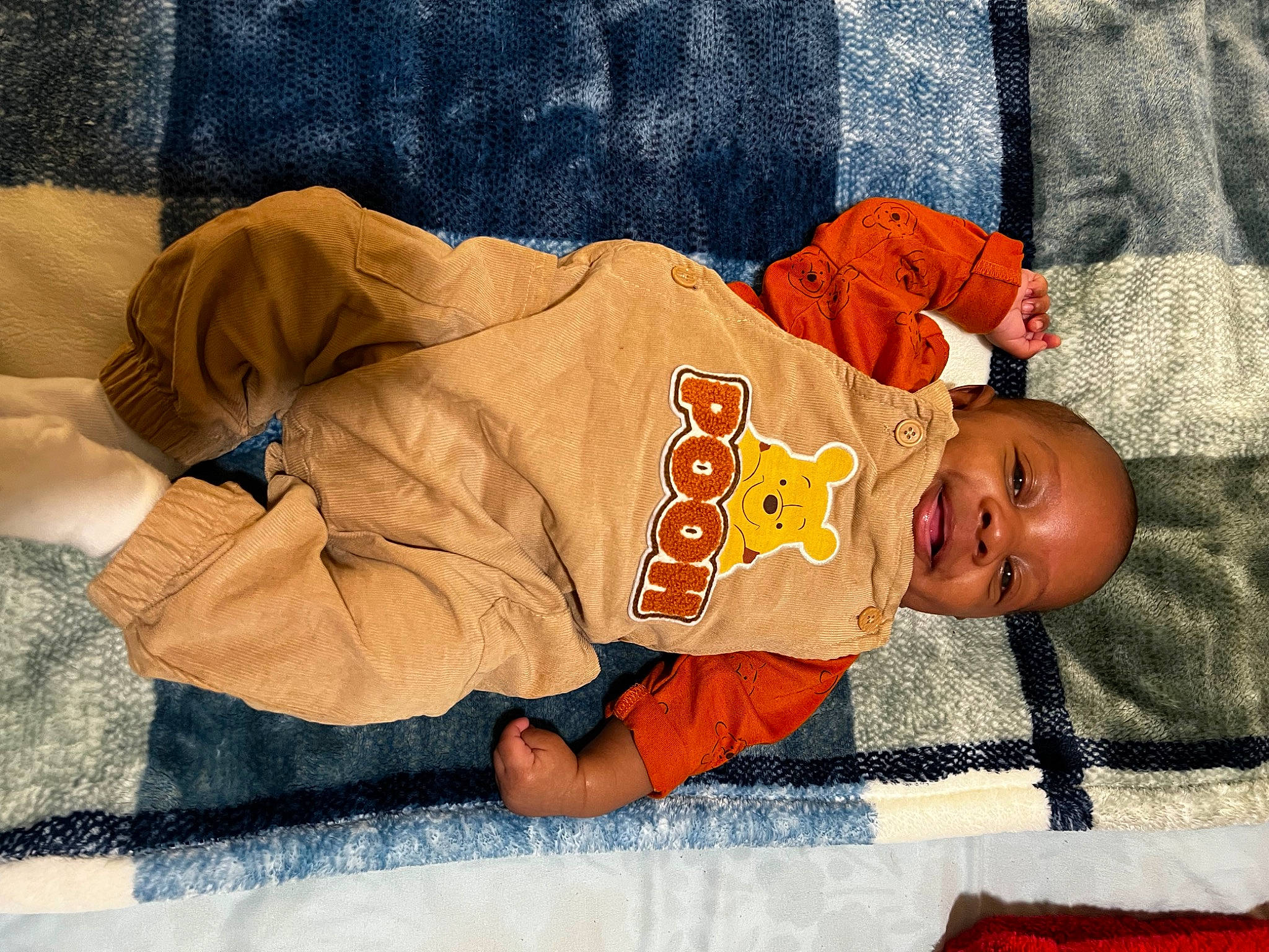 Zayvion is registered to the contest to win money with this photo: baby, baby_products, baby_safety, baby_sleeping, baby_toddler_clothing, bedtime, child, comfort, happy, linens, mammal, nightwear, orange, pattern, person, red, sleeve, smile, textile, toddler
