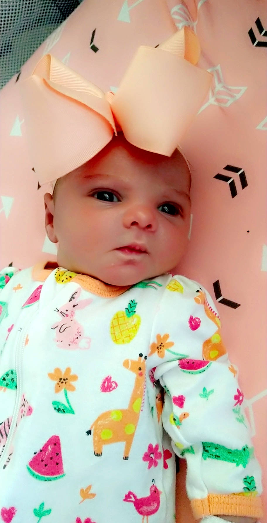 Venus is registered to the contest to win money with this photo: baby, baby_toddler_clothing, cheek, chin, collar, dress, eye, eyebrow, eyelash, face, facial_expression, happy, headwear, iris, lip, nose, person, pink, skin, sleeve
